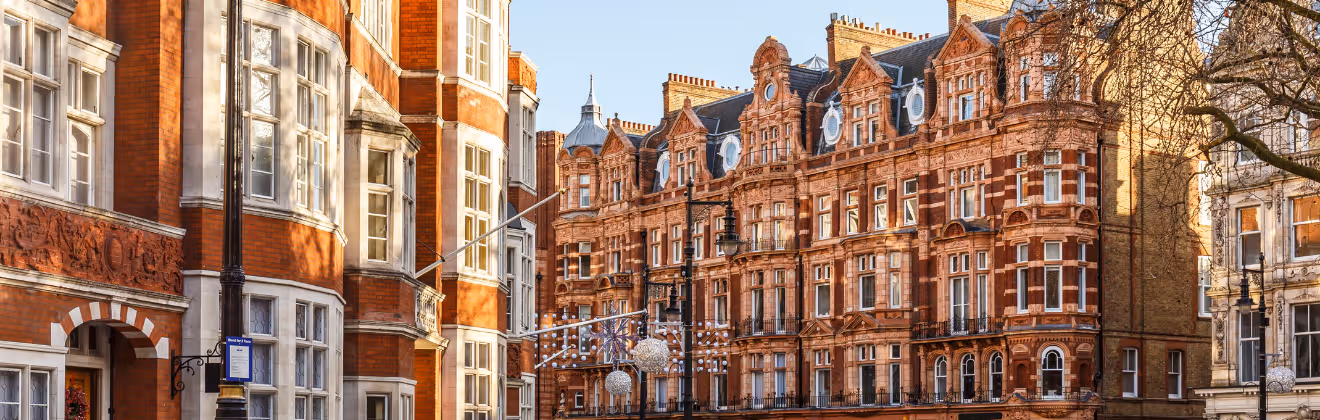 Classic red brick buildings on a Mayfair street corner