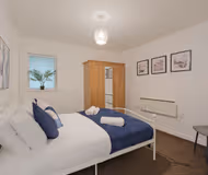 Open plan bedroom at 2 bed Manchester apartment