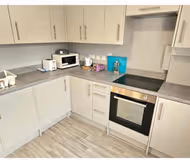 Home with 7 En-Suites & 4 Kitchens in Reading