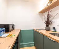 Elegant 5-Bedroom Parisian House with Air Conditioning, Two Kitchens, and Iconic City Access