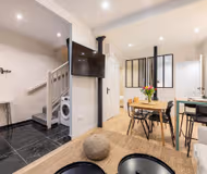 Elegant 5-Bedroom Parisian House with Air Conditioning, Two Kitchens, and Iconic City Access