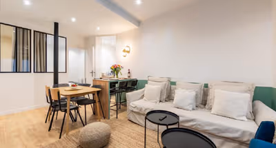 Elegant 5-Bedroom Parisian House with Air Conditioning, Two Kitchens, and Iconic City Access