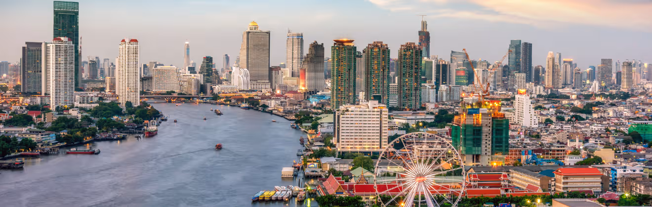 Bangkok skyline with Chao Phraya River at sunset