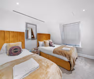 Luxury 3-Bedroom Apartment with Panoramic Roof Terrace Views
