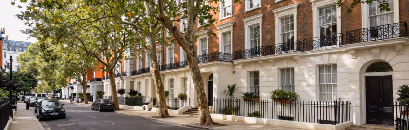 Islington London scene with leafy residential streets and classic townhouse architecture.