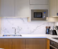 Premium Downtown 3-Bedroom Apartment with Balcony