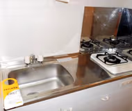 Simplistic living area in Shin Yokohama Apartments