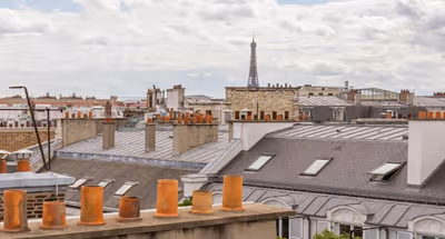 STRIKING SUNLIT PENTHOUSE WITH EIFFEL VIEWS