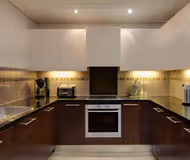 Equipped Kitchen at Green Point Serviced Apartment