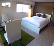 Simplistic living area in Minatoku Serviced Apartment