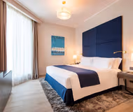 Bedroom at Diplomatic Street Serviced Apartments