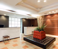 Simplistic living area in Awajimachi Apartments