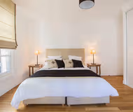 Luxury bedroom at SULLY MORLAND SERVICED APARTMENT MARAIS