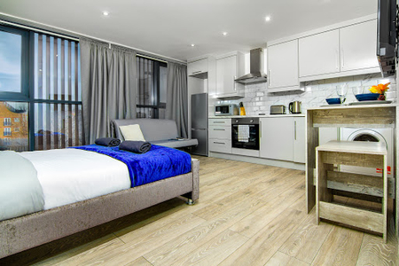 Open plan bedroom at The Brick Lane Apartments