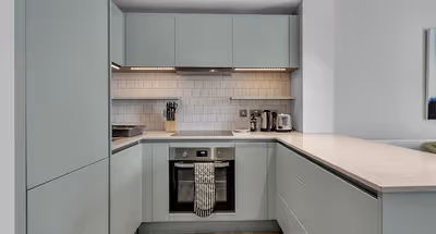 Fully equipped kitchen at Olympic Way Apartment in Wembley Park by MySquare