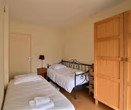 Single bed bedroom at Portes De Versailles Serviced Apartment