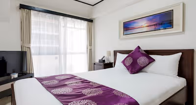 Simplistic living area in Kabukicho Serviced Apartment