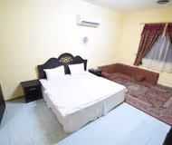 Bedroom at Al Kharj Road Serviced Apartment