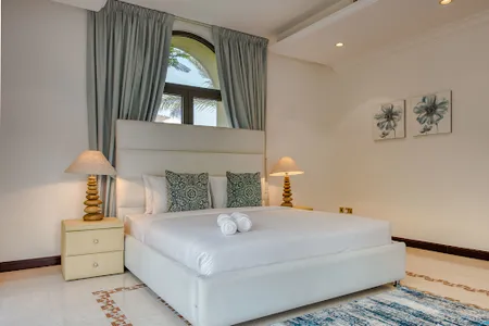 Luxury bedroom at Frond M Serviced Apartments