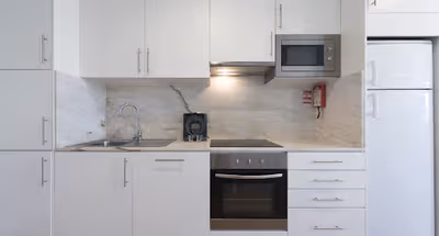 Fully equipped kitchen at Apartment with 1 bedroom