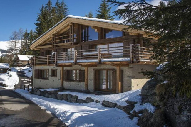 NESTLED JUST OFF THE SKI LIFT WITH ELEVATED VIEWS OF THE VALLEY OF VERBIER