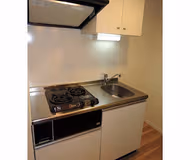 Simplistic living area in Nishiguchi Apartments