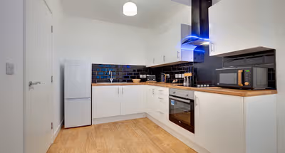 Fully equipped kitchen at Charlton's Bonds, Waterloo Street City Centre Apartment