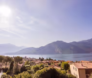 BASKING IN SUNSHINE WITH 180° LAKE VIEWS OVERLOOKING THE MAJESTIC MOUNTAINS & COMO