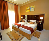 Open plan bedroom at Baghdad Street Serviced Apartments, Al Nahda 2