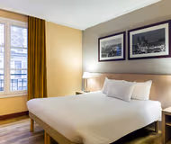 Luxury bedroom at Paris Adagio Serviced Apartment, Montmartre