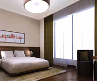 Luxury bedroom at Diplomatic Street Serviced Apartment