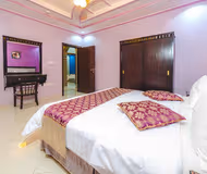 Bedroom at Prince Majid Road Serviced Apartment