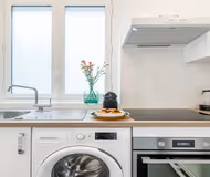 IN THE BEAUTIFUL TREE LINED BOULEVARD, JUST OFF ARC DE TRIOMPHE