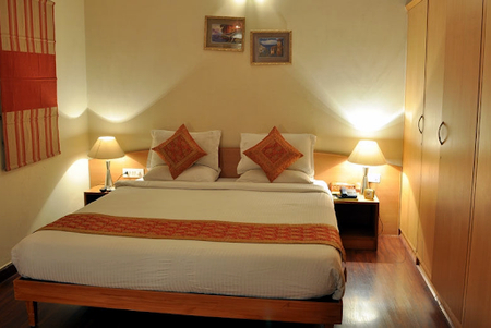 Simplistic living area in Indiranagar Serviced Apartment in Bengaluru