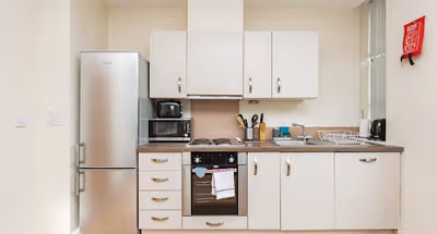 Fully equipped kitchen at Golden Heights Apartments