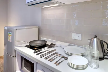 Fully equipped kitchen at Wing Lok Street Serviced Apartments, Sheung Wan