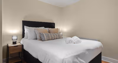 Bedroom at Short Term Rentals apartment