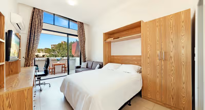 Bedroom at Hall Street apartments on Bondi Beach, Sydney