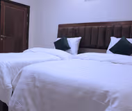 Bedroom at Al Rehab Serviced Apartment