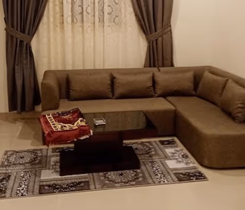 Living area at Al khalifa Al Mamoon Street Serviced Apartment