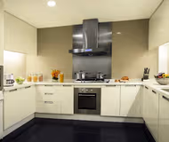 Fully equipped kitchen at Somerset Grand Central Dalian