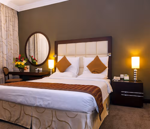 Luxury bedroom at Deira City Centre Street Serviced Apartments, Deira