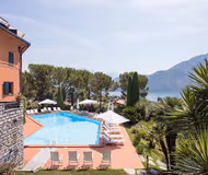 BASKING IN SUNSHINE WITH 180° LAKE VIEWS OVERLOOKING THE MAJESTIC MOUNTAINS & COMO
