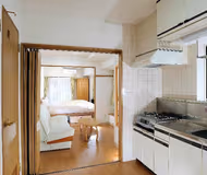 Comfy living area at Yoshinocho Apartments