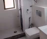 Simplistic living area in Indiranagar Apartments