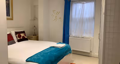 Bedroom at Hatter Suite