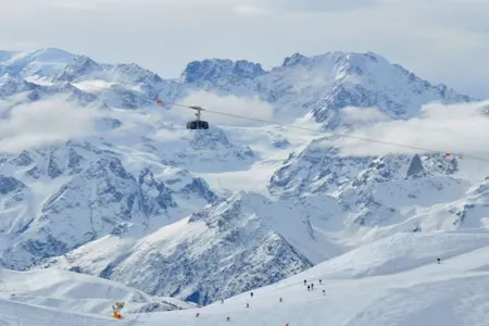 NESTLED JUST OFF THE SKI LIFT WITH ELEVATED VIEWS OF THE VALLEY OF VERBIER