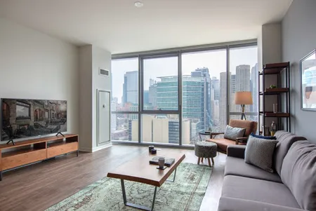 Living area at W. Madison #2006 Serviced Apartment, West Loop