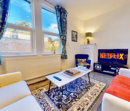 living space at Funky 2 Bed Duplex Apartment in the Heart of Historic Rochester