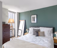 Luxury bedroom at North Clark Street #1609 Serviced Apartment, Lincoln Park